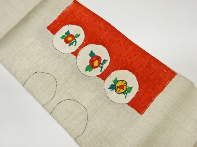 手織り真綿紬花に丸文模様織出し名古屋帯